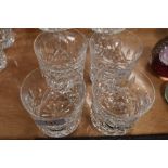 A selection of four clear cut crystal tumbler glasses by Waterford in good condition