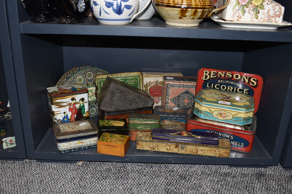 A selection of vintage and antique advertising promotional tins including pressed examples and