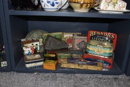 A selection of vintage and antique advertising promotional tins including pressed examples and
