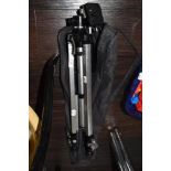 A photographers camera tripod in carry case the Helios T - 1