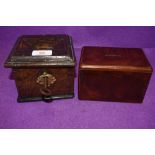 An antique money deposit box or similar lockable wooden safe of small size with key and similar