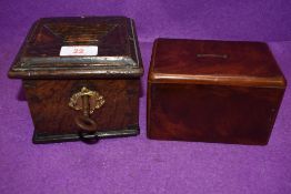 An antique money deposit box or similar lockable wooden safe of small size with key and similar