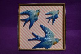 A genuine still boxed set of wall mounted chalk ware Swallows or Swift birds circa 1950's
