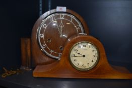 A Naploeon style mantle clock having inlayed veneer case 8 days Swiss made and similar Art Deco