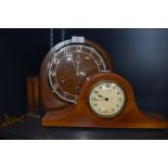 A Naploeon style mantle clock having inlayed veneer case 8 days Swiss made and similar Art Deco