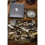 A selection of table wares and cutlery including small brass spy glass