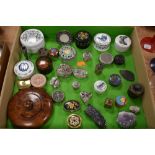 A selection of trinket snuff and similar cases including papier mache and semi precious stones