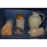 A selection of earthen ware jugs and bed warmers also cast stove iron