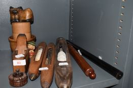 A selection of wooden treen items including Mill loom shuttles and draught man ruler and box plane