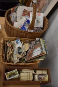 A selection of world wide stamps and similar collectable cigarette and tea cards