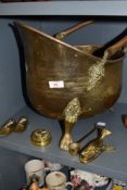 A brass worked helmet style coal bucket and similar brass wares
