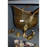 A brass worked helmet style coal bucket and similar brass wares