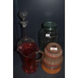 A selection of glass wares including Dewsbury glass jar, Orange art deco shade and decanter