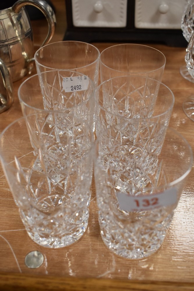 A selection of six clear cut crystal glasses one having chip to rim