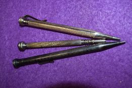 Three propelling pencils including 44 carat rolled gold WHAL and similar