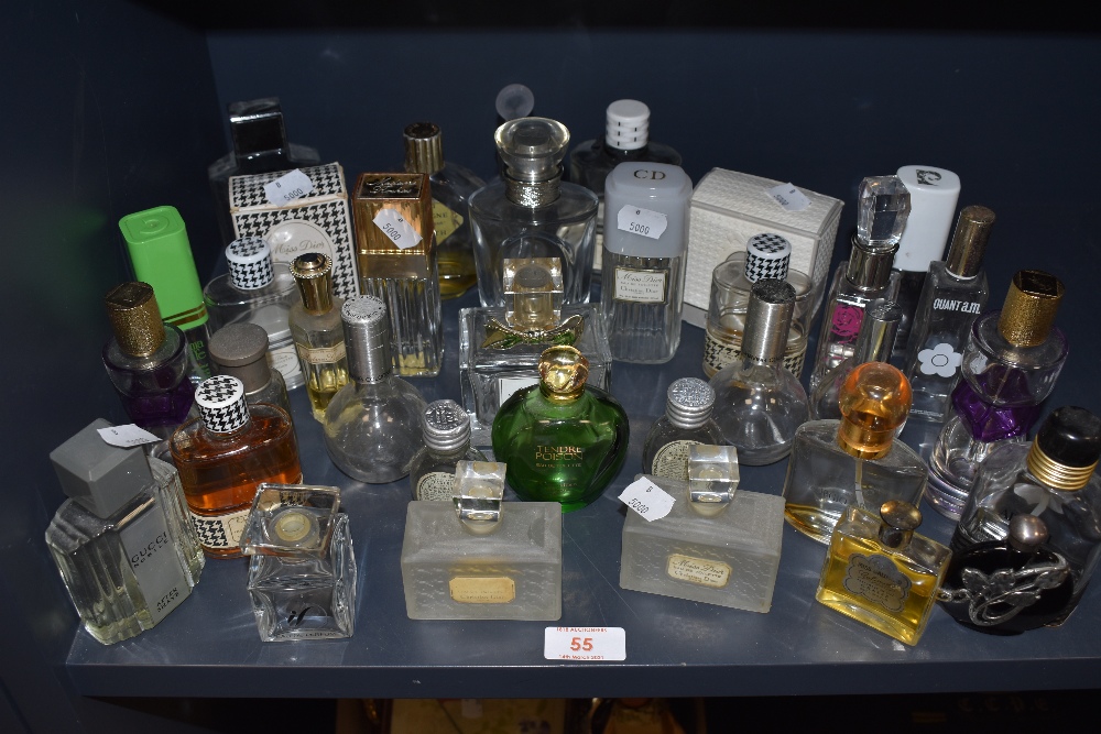 A selection of vintage and modern perfumes and aftershaves including fancy bottles and Miss Dior