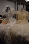 Two retro wedding dresses and accessories.