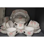 A part tea service by Standard China pat no 8595 in a deco design 23 pieces in total