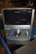 A Sony Hi Fi music system or center with speakers