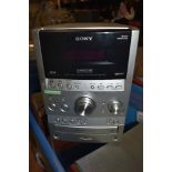 A Sony Hi Fi music system or center with speakers