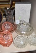 A selection of clear cut and crystal glass wares including boxed Edinburgh vase and pink pressed