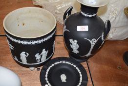 Three pieces of black basalt Jasper ware by Wedgwood including twin handled vase 27cm approx also