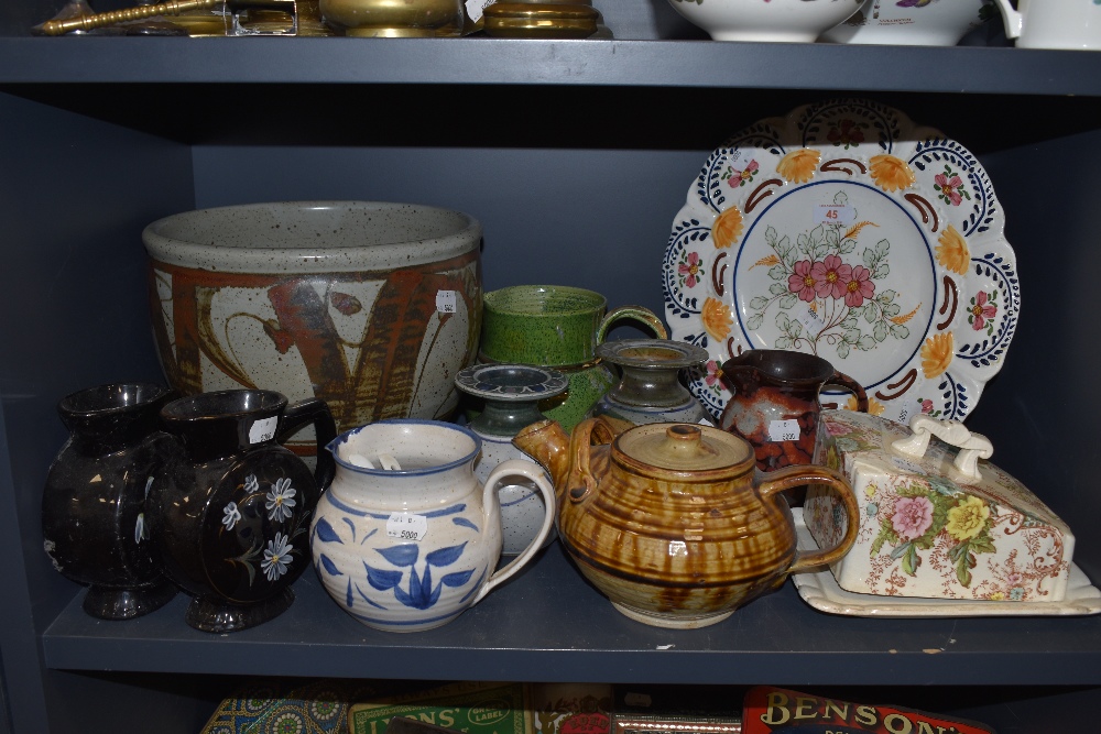 A selection of ceramics including barge ware jugs studio pottery and lidded cheese dome