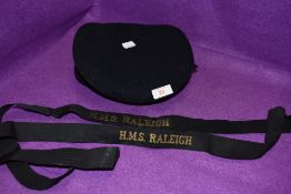 A Navy hat or cap from the H M S Raleigh and similar ribbons