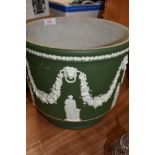 A large ceramic jasper ware planter stamped Wedgwood to base 23cm high in an sage green