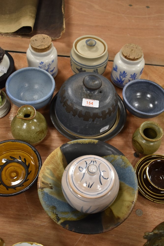 A selection of studio and similar pottery including lidded dome