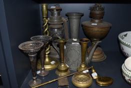 A selection of metal and plated wares including pewter Hutton tall stem vase and pair of brass