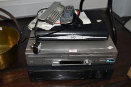 A Sony Video tape player and similar Sony DVD VHS recorder both with remotes