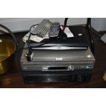 A Sony Video tape player and similar Sony DVD VHS recorder both with remotes