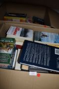 Two boxes of mixed books including novels and more.