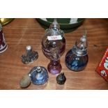 A selection of scent and perfume bottles including Eirian Welsh art glass