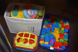 A selection of childrens toy games and building blocks like Duplo