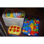 A selection of childrens toy games and building blocks like Duplo