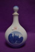 A Royal Copenhagen decanter bottle depicting Rosenborg Castle