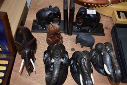 A selection of heavy ethnic hard wood tribal African Elephants hand carved including book end pair