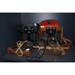 A selection of binoculars including Skybolt 7 x 50 and Pathescope 10 x 50