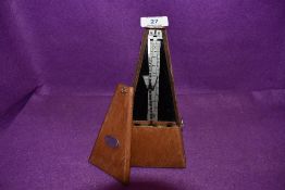 A Maelzel Paquet music metronome