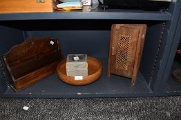 A selection of treen wood items including oak letter rack