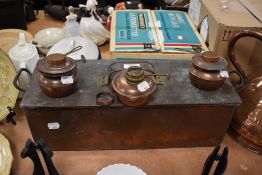 A selection of copper wares including large steamer and spirit burners