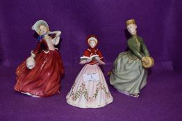 A selection of Royal Doulton figurines including Tenth day of Christmas, Grace and Autumn Breezes