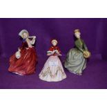 A selection of Royal Doulton figurines including Tenth day of Christmas, Grace and Autumn Breezes