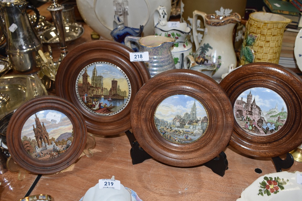 A selection of four antique pratt ware pot lids framed depicting continental scenes