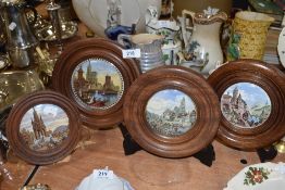 A selection of four antique pratt ware pot lids framed depicting continental scenes