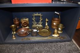 A selection of brass and copper wares including small gong stand and graduated sauce pans