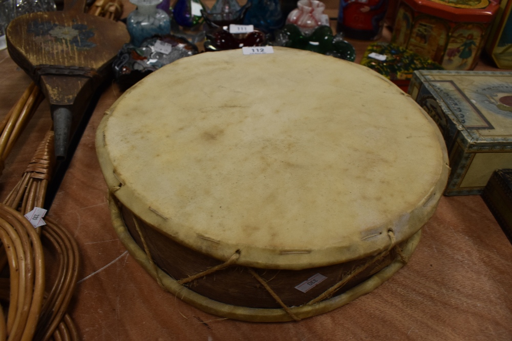 A traditional animal skin drum or Tom