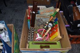 A selection of childrens toys games and musical instruments